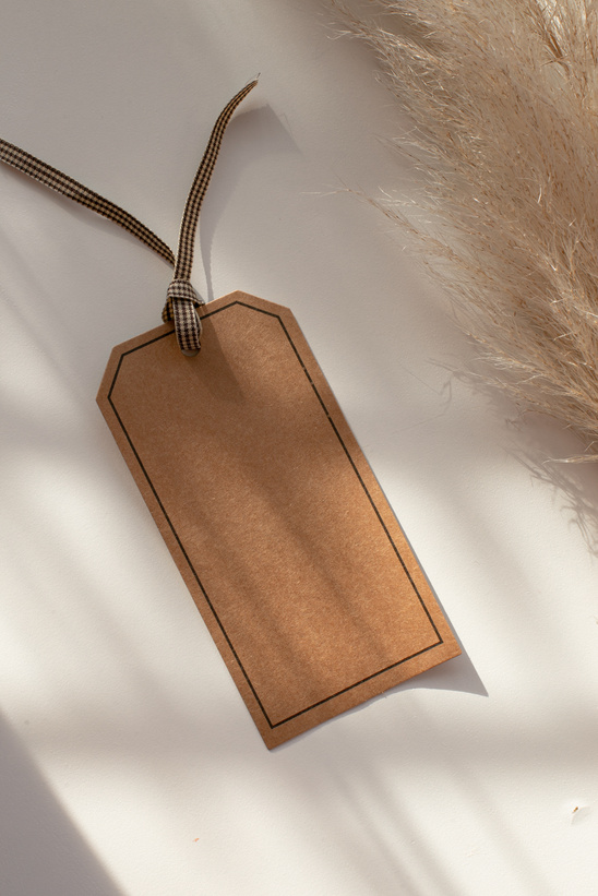 Blank Price Tag on White Surface